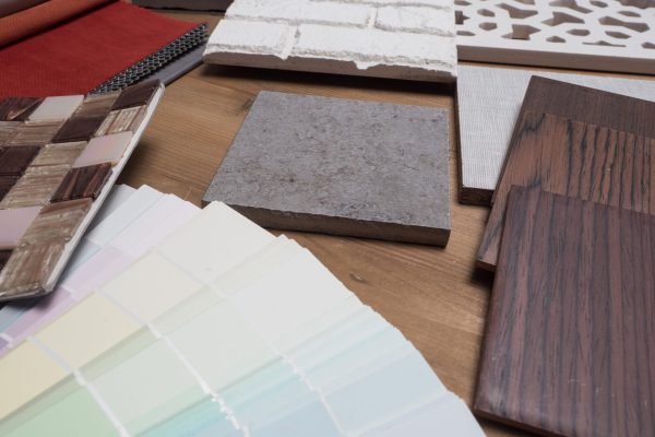 Samples of material, wood , on concrete table.Interior design select material for idea. Decoration idea concept vintage material.